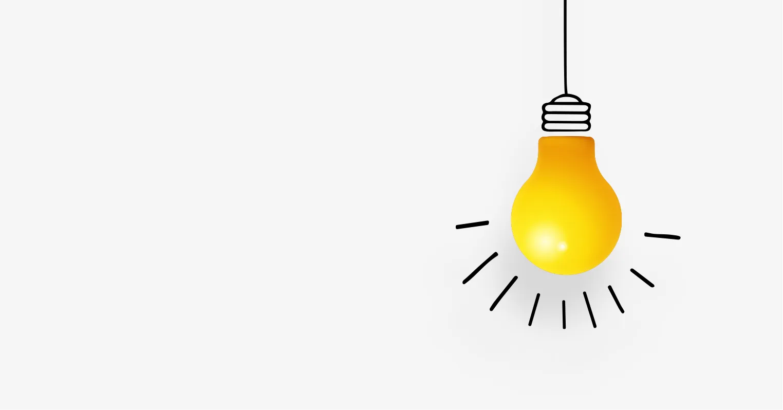 A yellow lightbulb with lines coming from it representing a bright idea