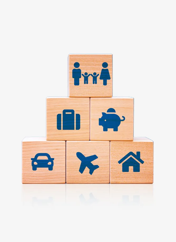 six wooden blocks stacked in a 3, 2, 1 formation, all of them have symbols depicting things such as a family, suitcase, car and house